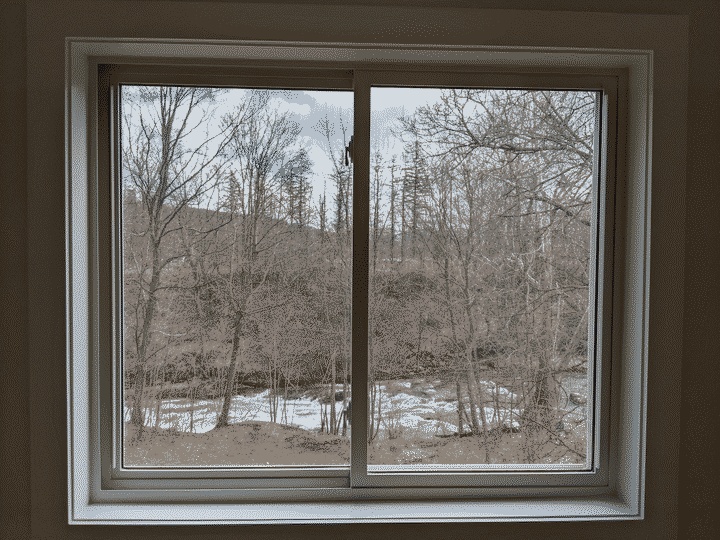 A window framing the Green River in Williamstown, MA