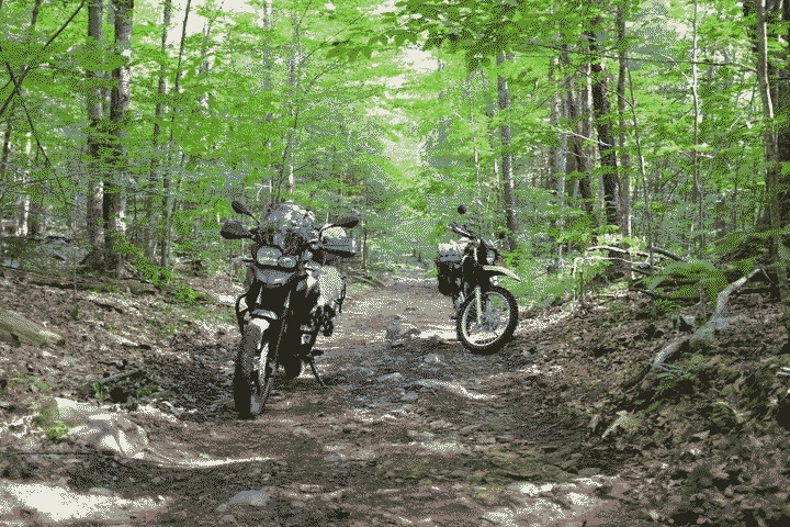 Yorda (previously my motorcycle, now belonging to Russ) and my rental on a class four trail